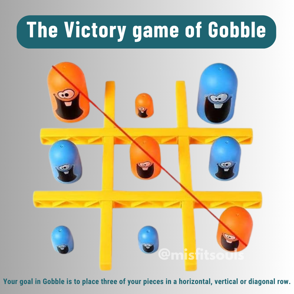 Gobble Game board with orange and blue cartoon pieces demonstrating a diagonal victory. Fun tic-tac-toe strategy game for kids and families focused on creating a row of three.