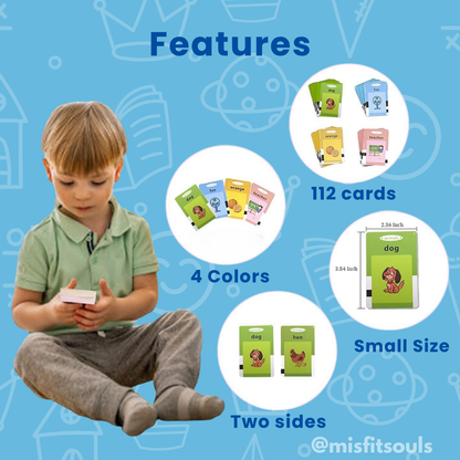 Colorful stack of 112 flash cards in four colors, double-sided and toddler-sized, demonstrating word learning with a seated child"